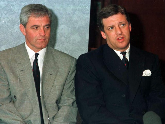 Smith sits with chairman David Murray after taking over from Souness, who decided to leave for Liverpool.