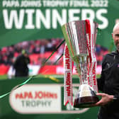 Paul Warne, manager of Rotherham United with the Papa John's trophy (photo by Catherine Ivill/Getty Images).