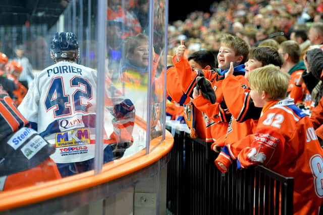 Young Sheffield Steelers fans cheers on their heroes at the Arena