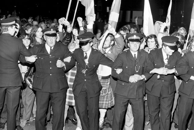 Police hold back supporters after Harry Ewing wins the Falkirk by-election in September 1971.