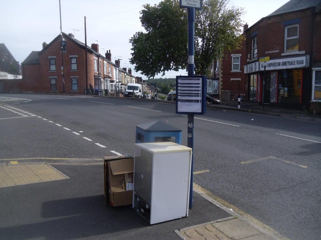 Waiting for a bus at Highfields in Sheffield by Roger Stevenson