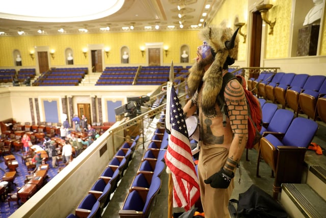 A protester yells inside the Senate Chamber.