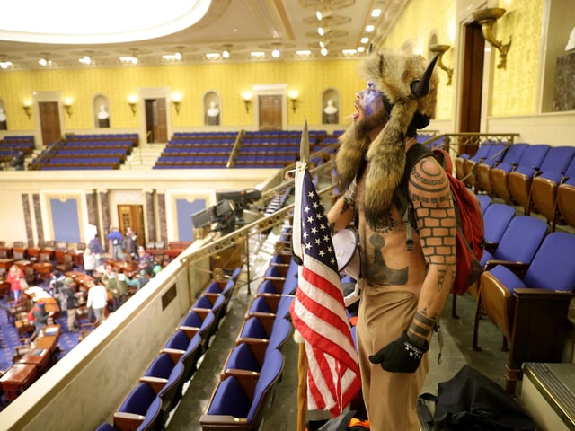 A protester yells inside the Senate Chamber.