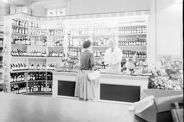 A display of wine at W. McLeod licensed grocers, at 340 Morningside Road, in July 1962.
