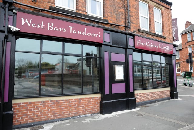 Serves traditional, balti and English dishes.