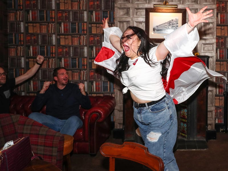 Fans pictured in The Kings pub celebrating as England score their second goal. Picture: Stuart Martin (220421-7042)