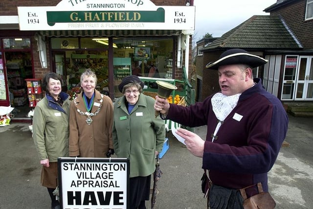 Pictured on  Stannington Road, where Bob Bridge, the town crier, was in full song to promote the village appraisal study. Seen with him are Bradfield Parish Council members, left to right: Coun Mary Briggs, Chair of Council Lynette Jackson, and Coun Ruth Labedz, March 8, 2003