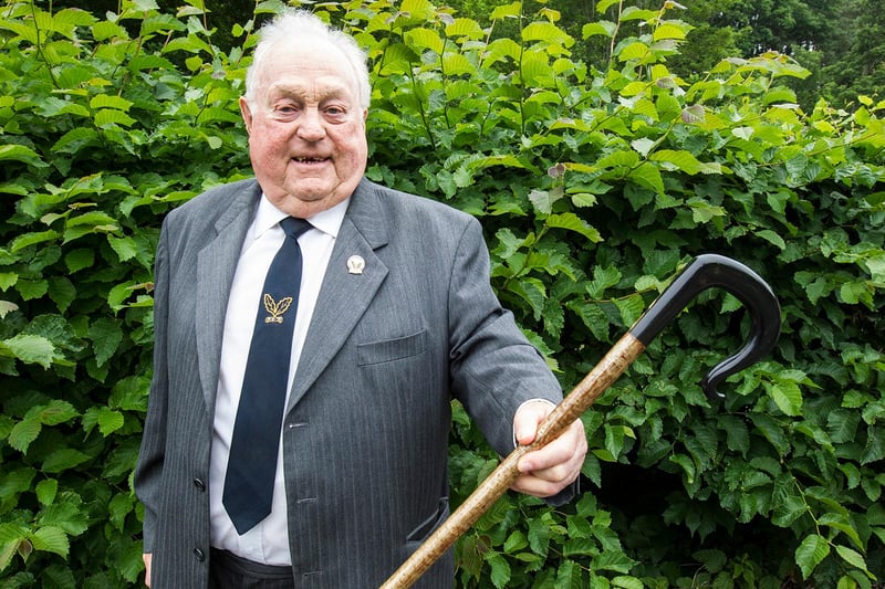 Golden Jubillee Herald Jock Murdoch was presented with a walking stick at the Capon tree on Festival Day. (Photo: BILL McBURNIE)