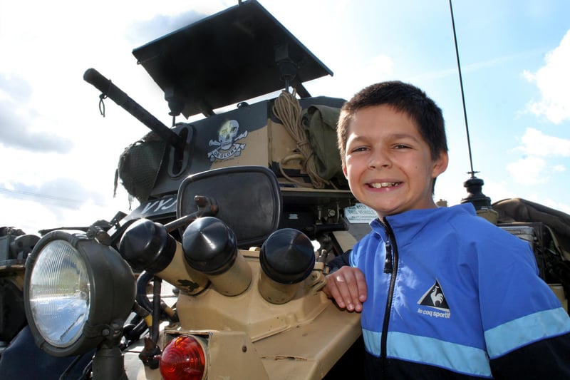 Callum Mair, 10, checks out a tank at Poolsbrook Country Park's tenth anniversary fun day in 2009.
