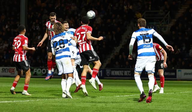 Jack Robinson of Sheffield United heads home the Blades' second goal against QPR: David Klein / Sportimage