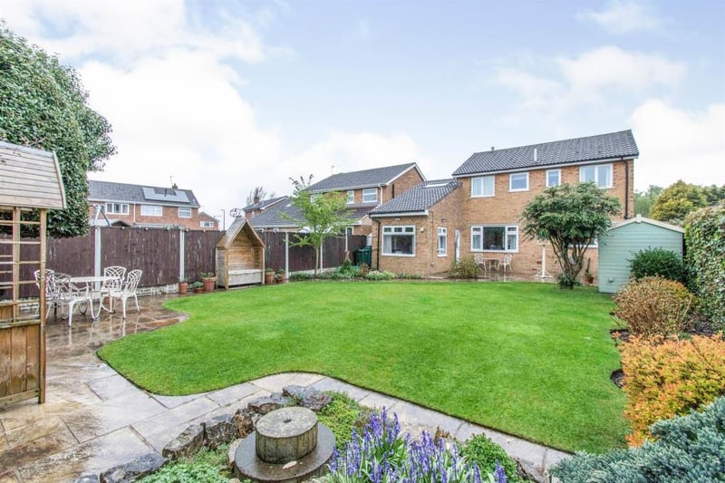 Rear enclosed lawned garden with patio areas ideal for alfresco dining. There are rear and side outside taps, outside power points, a water feature and rockery features.