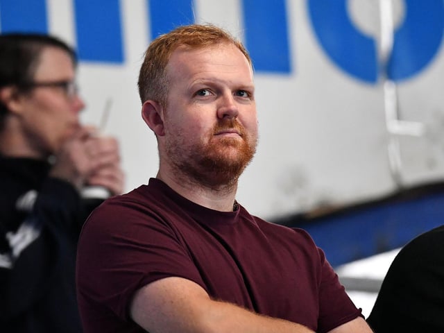 A Sunderland fan takes in the action at Fratton Park.