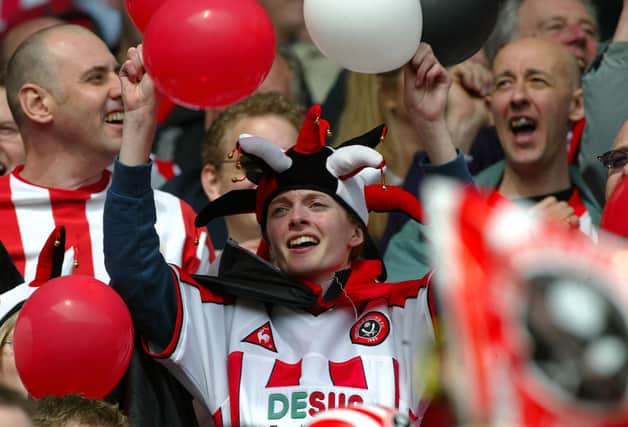 Sheffield United fans during their FA Cup semi-final match against Arsenal at Old Trafford in April 2003. PA Photo: Martin Rickett