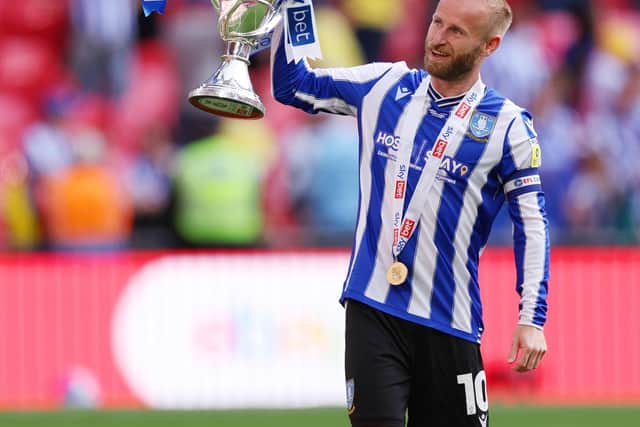 LONDON, ENGLAND - MAY 29: Barry Bannan of Sheffield Wednesday celebrates with the trophy after the team's victory and promotion to the Sky Bet Championship in the Sky Bet League One Play-Off Final between Barnsley and Sheffield Wednesday at Wembley Stadium on May 29, 2023 in London, England. (Photo by Richard Heathcote/Getty Images)