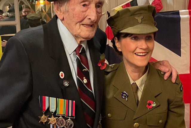 Pictured is John Wilson and Lorrie Brown.
Husband and wife Gary Birtles and Lorrie Brown from Groovy Gazza Productions performed a ‘Salute to Vera Lynn’ at the Olde House in Newbold to commemorate Armistice Day.
In the audience was Chesterfield man John Wilson, a retired RAF Officer who has written a book about the death of his brother in a bombing mission over Germany, titled 'No Known Grave'. Ken, of Old Whittington, was just 22 and was due to get married just a few weeks later.