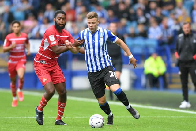 Sheffield Wednesday forward Florian Kamberi is in as the only change for the Owls' clash with Wigan Athletic.