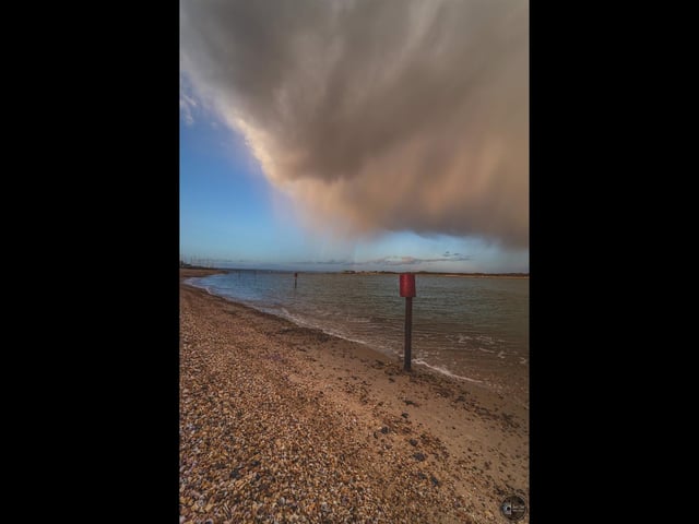 Menacing Cloud and a Rainbow in the distance at Eastney Beach