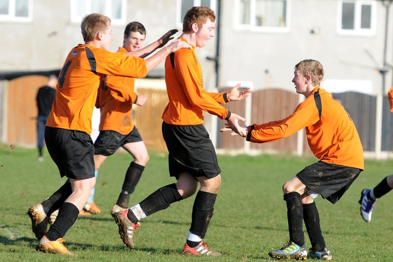 Scawthorpe U17s' Gareth Mountain celebrates scoring with Cameron Jones and Kieran Doidge in 2011.