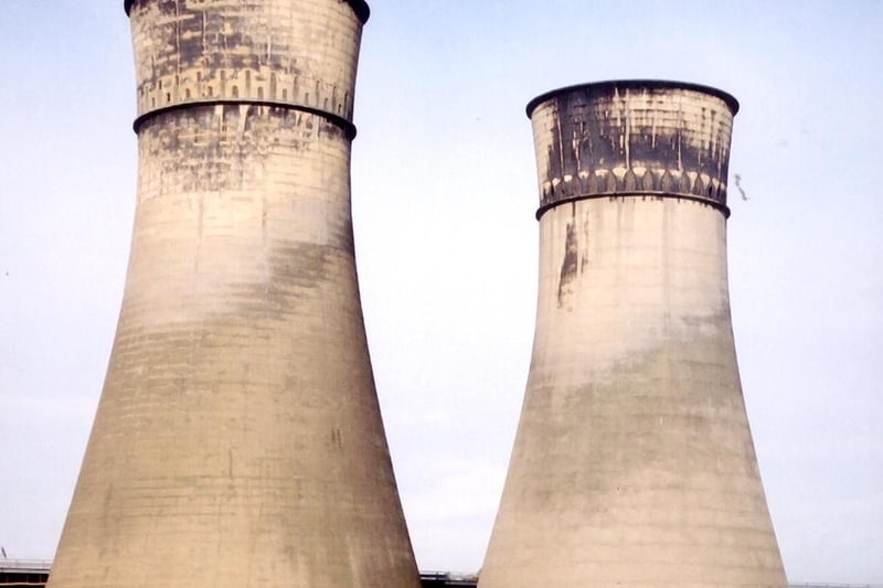 The famous Tinsley cooling towers, taken from the former Blackburn Meadows Power Station site with the M1 motorway Viaduct in the background. This picture was taken in 2003 and the towers were demolished in 2008. Ref no t01918