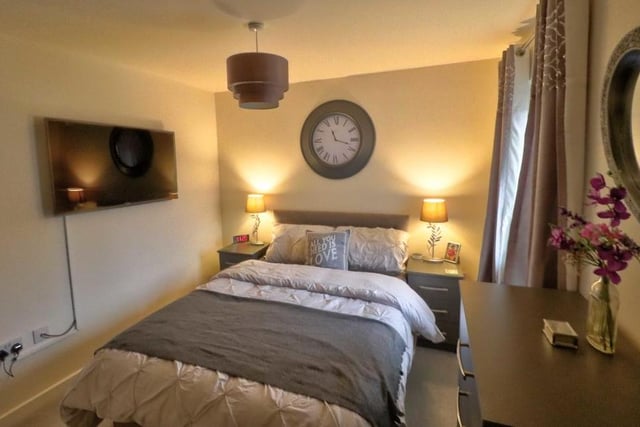Moving swiftly upstairs and into the homely main bedroom, which has its own en suite facilities. There is also a built-in storage cupboard, a carpeted floor and a uPVC double-glazed window.