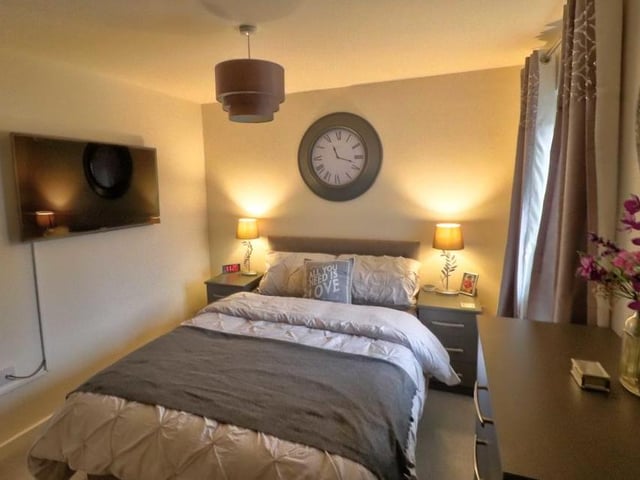 Moving swiftly upstairs and into the homely main bedroom, which has its own en suite facilities. There is also a built-in storage cupboard, a carpeted floor and a uPVC double-glazed window.