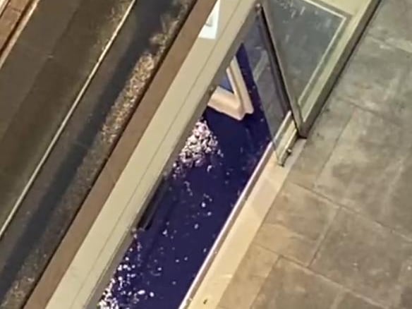 Several stores in the new development were impacted by the heavy rainfall. This is a screenshot of a video showing water flooding the entrance to Boots in St James Quarter.