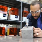 2020 - Abdul Haque, technical lead in metal additive manufacturing at the AMRC, inspects a lightweight fuel tank for small scale satelilites, designed and developed at the AMRC as part of the MiniTANKS project