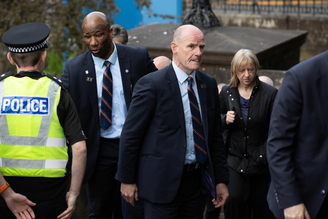 Former Rangers players Marvin Andrews (L) and Gordon Durie arrive for the service