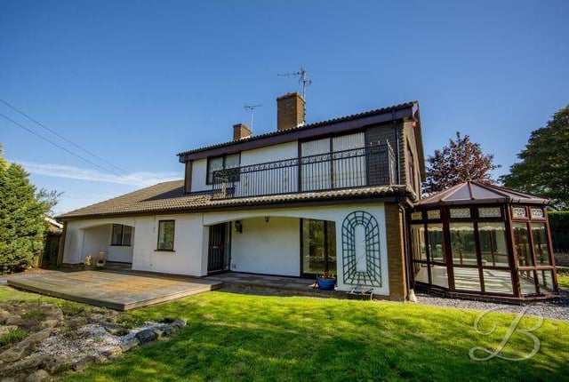 This four bedroom house house has an unusual oval conservatory. Marketed by Buckley Brown, 01623 355797.