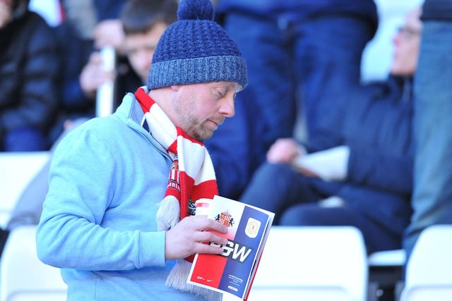 A strong scalf-hat combination on display from this Sunderland fan.
