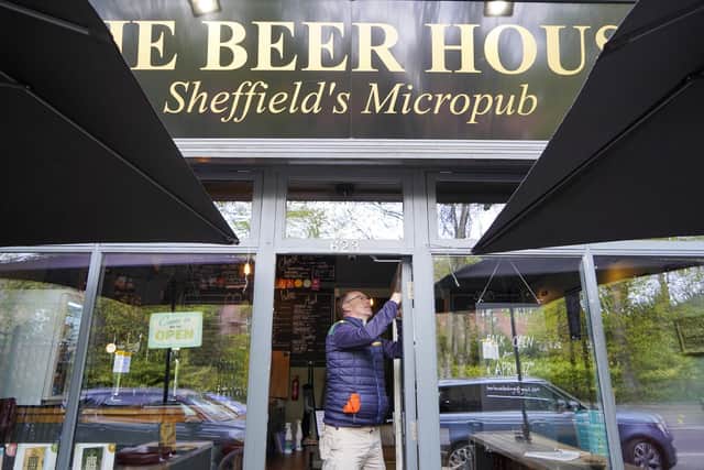 Co-owner Chris Sinclair makes repairs at The Beer House on Ecclesall Road which has been victim of a break-in. Picture Scott Merrylees
