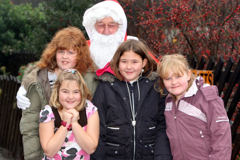 Father Christmas meets just some of the travellers as the Santa Specials take off at Peak Rail near Rowsley in 2007