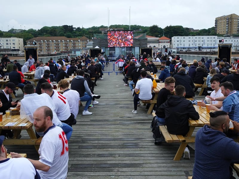 England fans in East Sussex watch the game via a big screen set up in a fan zone on Hastings pier (Chris Eades/Getty Images)