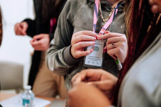 Young people receive mental health cue cards to remind them of strategies they've learned