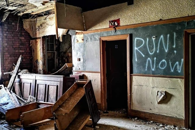An ominous sign inside the old Queen's Hotel pub on Scotland Street, Sheffield, which has since been demolished