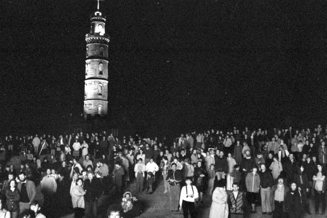 Crowds gathered on Calton Hill Edinburgh to watch the beacon lit on the Observatory to celebrate the Royal Wedding in July 1981.