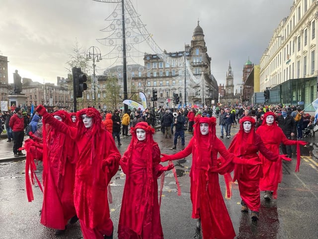 The Red Rebel Brigade join in the march.