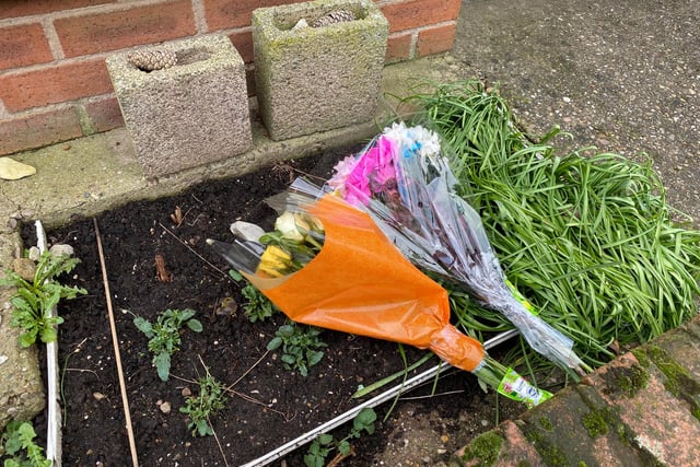 Flowers have started to be laid following the baby's death.