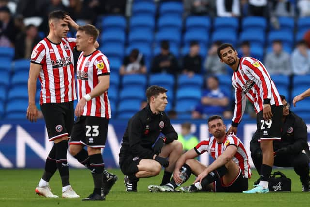 Jack Robinson of Sheffield United looks gutted after being forced off: Darren Staples / Sportimage