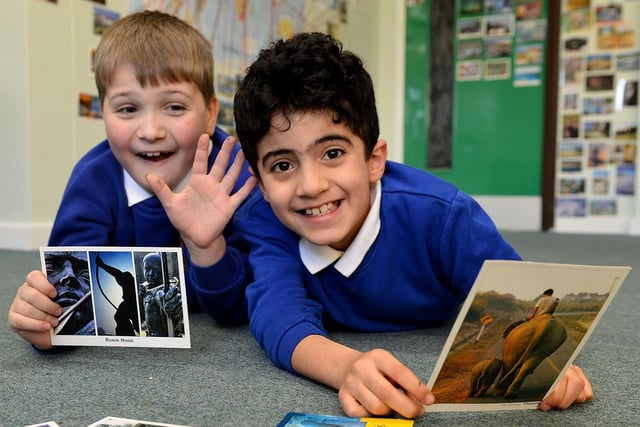 Fellgate Primary School pupils Will Ahmed (left) and Daniel Shavardi were adding postcards to the vast collection on display in their classroom. Who can tell us more?