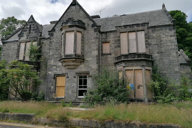 The former Fife College Priory Campus in Kirkcaldy - boarded up with the exception of a ground floor window which has been smashed