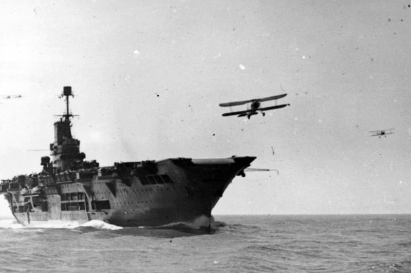 The Ark Royal, with planes flying around her deck during her patrol.   (Photo by Keystone/Getty Images)