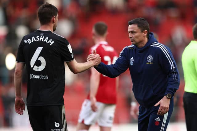 Paul Heckingbottom, manager of Sheffield United, acknowledges Chris Basham after his return to the side at Bristol City: Darren Staples / Sportimage