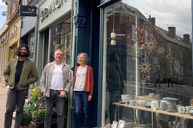 Coun Minesh Parekh, left, with Jonathan Bagge and Sarah Worth, who led a successful Economic Recovery Fund round one project in Broomhill, Sheffield designed to revitalise the shopping area. They are pictured outside their businesses, Pavilion Flowers and Worth Interiors. Picture: Sheffield Labour