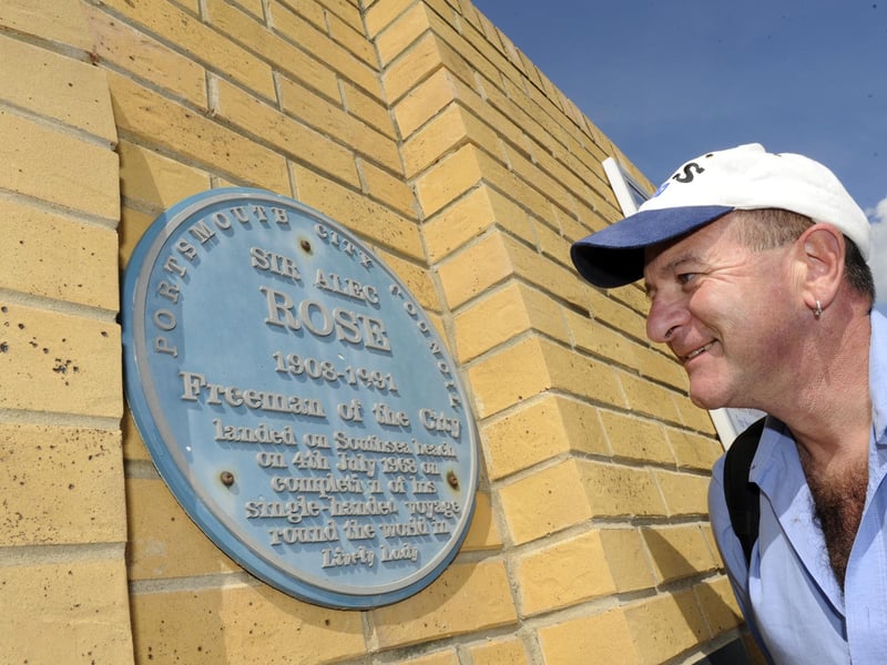 The former Royal Navy sailor and greengrocer made waves with with passion for amateur single-handed sailing. He took part in the second single-handed Atlantic race in 1964 and circumnavigated the globe single-handedly in 1967–68, for which he was knighted. His boat Lively Lady is still seaworthy and is used for sail training by a charity. A plaque can be found along Southsea seafront on the wall by the hovercraft which commemorates his landing point after his epic voyage.
Pictured: John Edwards from the USA investigates the Sir Alec Rose plaque on Southsea sea front.