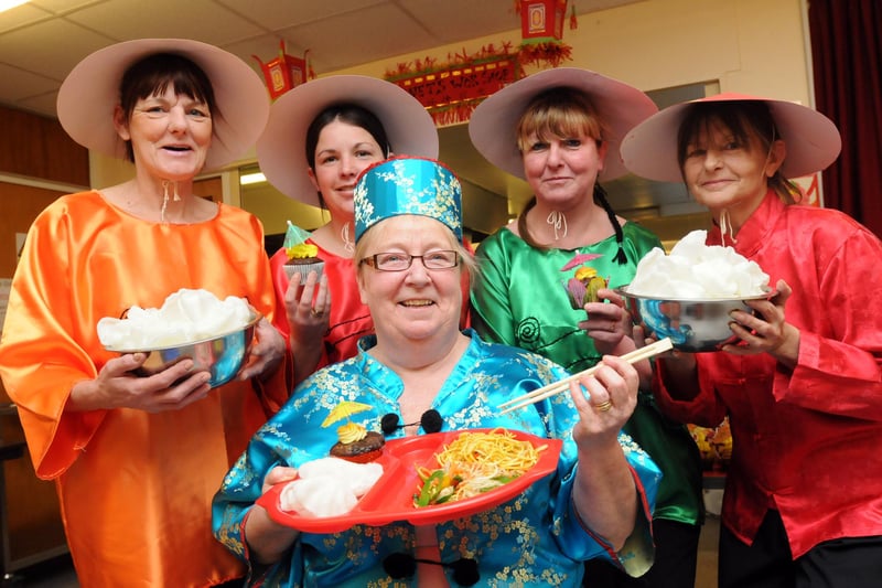 Kitchen staff Karen Phillips, Ashleigh Potts, Monika Saunders and Wendy Pye with Janet Orrock (front) were enjoying Chinese food in this scene from 2014.