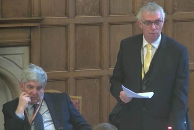 LibDem Couns Mike Levery, standing, and Coun Andrew Sangar, left, both spoke at a meeting of Sheffield City Council's finance committee that discussed budget pressures. Picture: Sheffield Council webcast