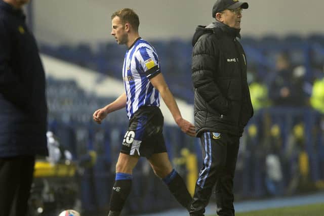 Jordan Rhodes walks striaght past Sheffield Wednesday boss Tony Pulis after being substituted having come off the bench agaisnt Stoke.   Pic Steve Ellis
