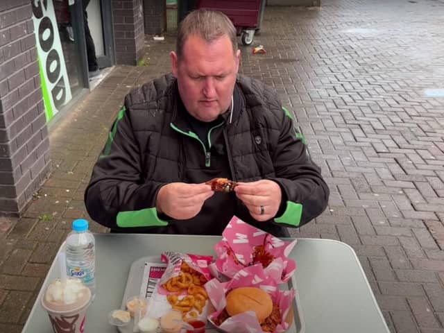 Rate My Takeaway YouTube star Danny Malin eats at Munchies on London Road, Sheffield, which was recently named Britain's best takeaway. Photo: Rate My Takeaway/Danny Malin