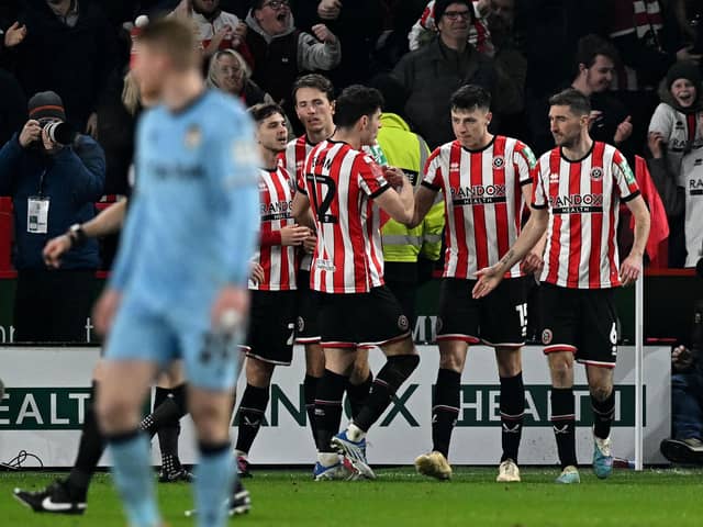 Anel Ahmedhodzic (second right) celebrates scoring the opening goal during the FA Cup fourth round-replay between Sheffield United and Wrexham at Bramall Lane: PAUL ELLIS/AFP via Getty Images